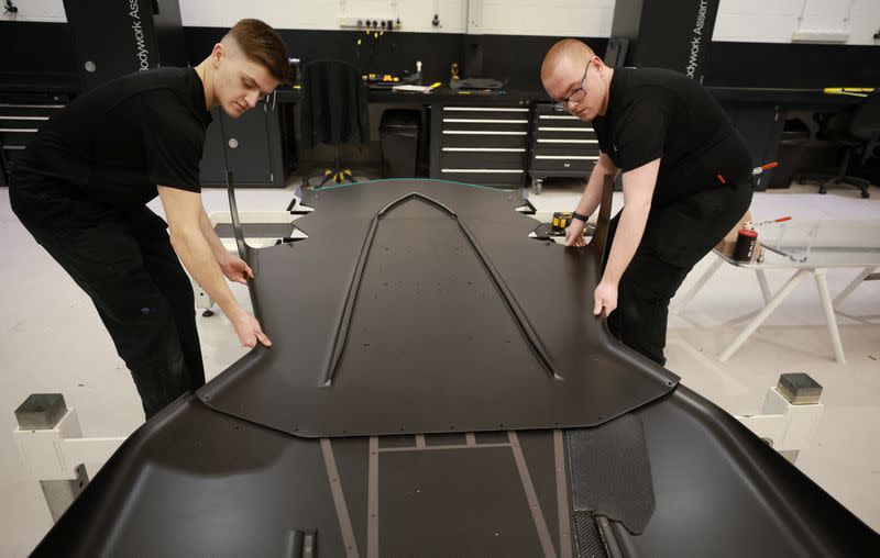 Workers assemble a floor pan for a BAC Mono car at the company's factory in Liverpool