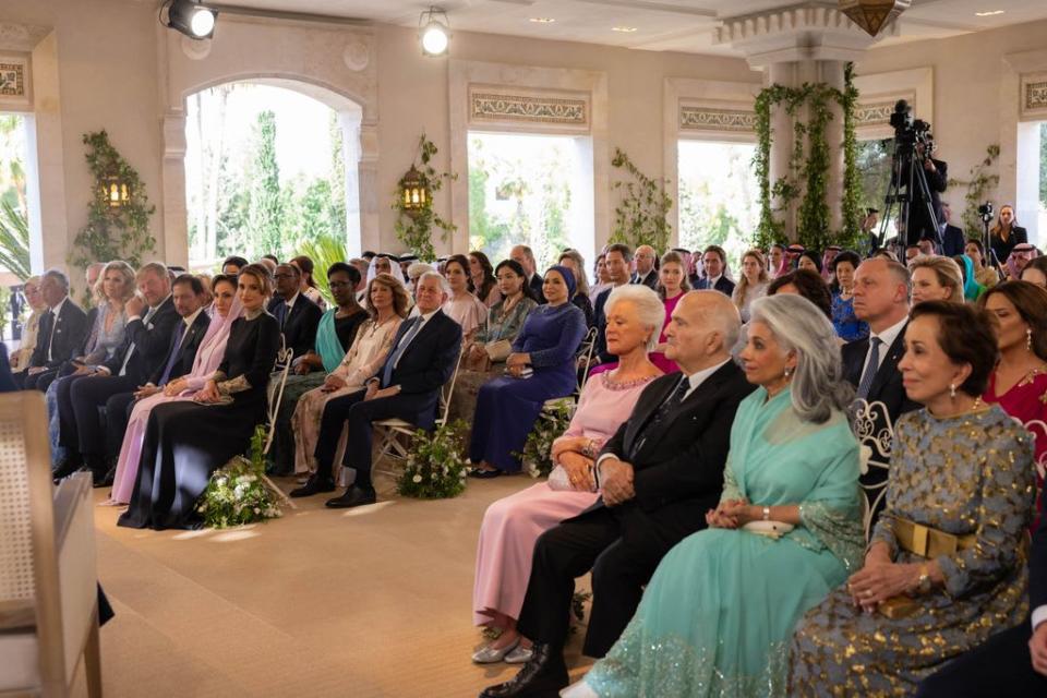 Queen Rania and fellow guests at Prince Hussein's wedding