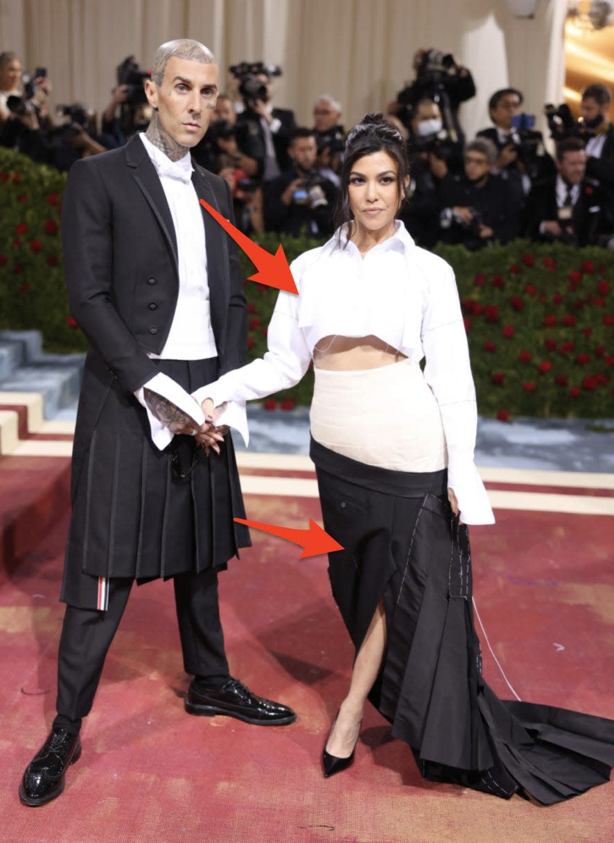 Travis Barker and Kourney Kardasian in matching black and white outfits at 2022 Met Gala