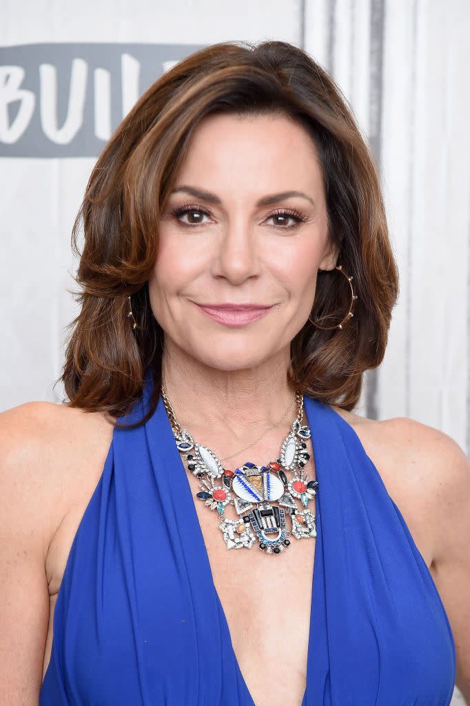 <p>If you want to get bangs without the commitment, take a page from <em>Real Housewives of New York City</em> star Luann de Lesseps. The slight side bang echoes the layers in her trademark shoulder-length cut. </p>