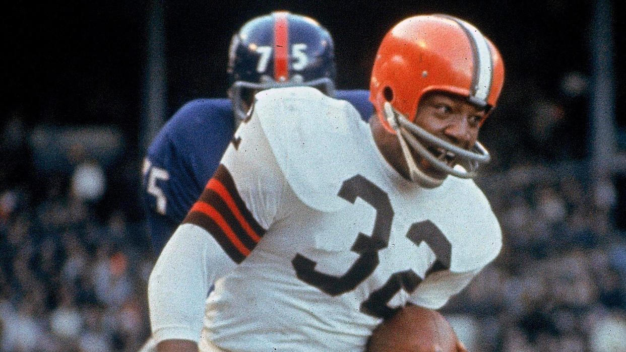 Mandatory Credit: Photo by Uncredited/AP/Shutterstock (10620159a)Cleveland Browns running back Jim Brown (32) carries the ball during an NFL football game against the New York Giants in Cleveland.