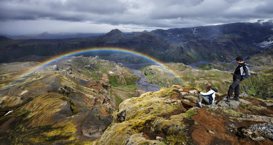A landscape view of a rainbow appearing on Iceland’s Laugavegur trek. (Michael Fersch/Caters News Agency)