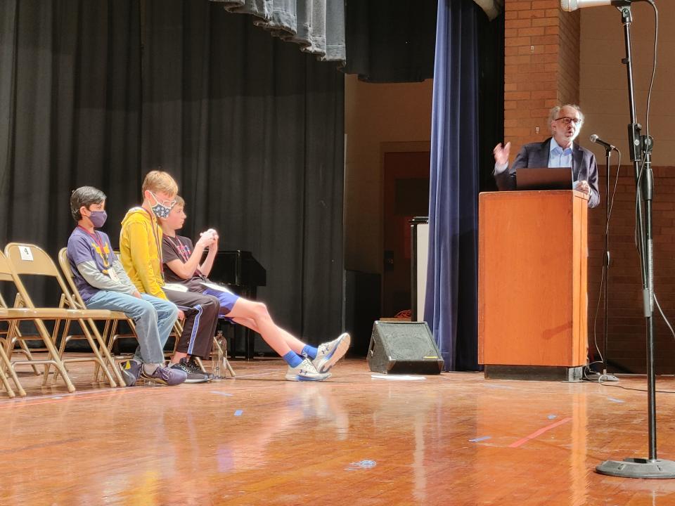 The three finalists of the Potter County Spelling Bee look on as they await the next round of words Thursday afternoon.