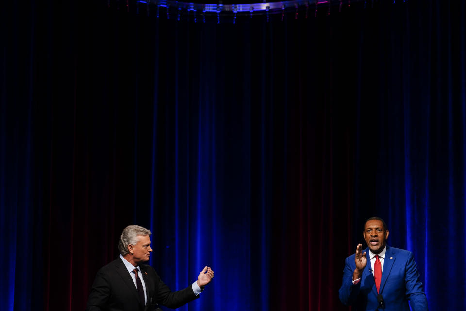 Mike Collins, left, and Vernon Jones participate in Georgia's 10th Congressional District republican primary election runoff debates on Monday, June 6, 2022, in Atlanta. (AP Photo/Brynn Anderson)