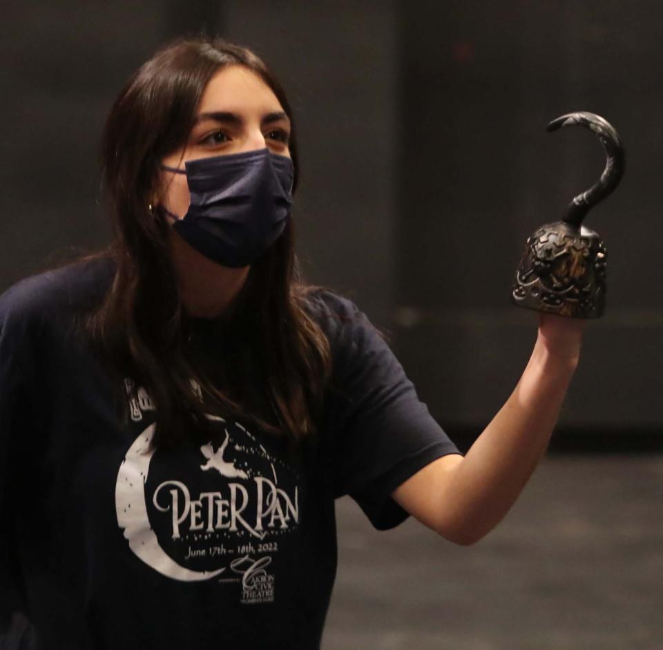Emelia Aceto of Highland High School portrays Captain Hook during an All-City Musical rehearsal of "Peter Pan" at Sandefur Theater in the University of Akron's Guzzetta Hall.