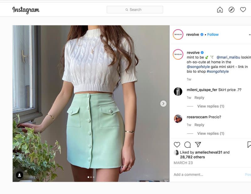 A model wears a $148 Song of Style mint-colored mini-skirt made by REVOLVE