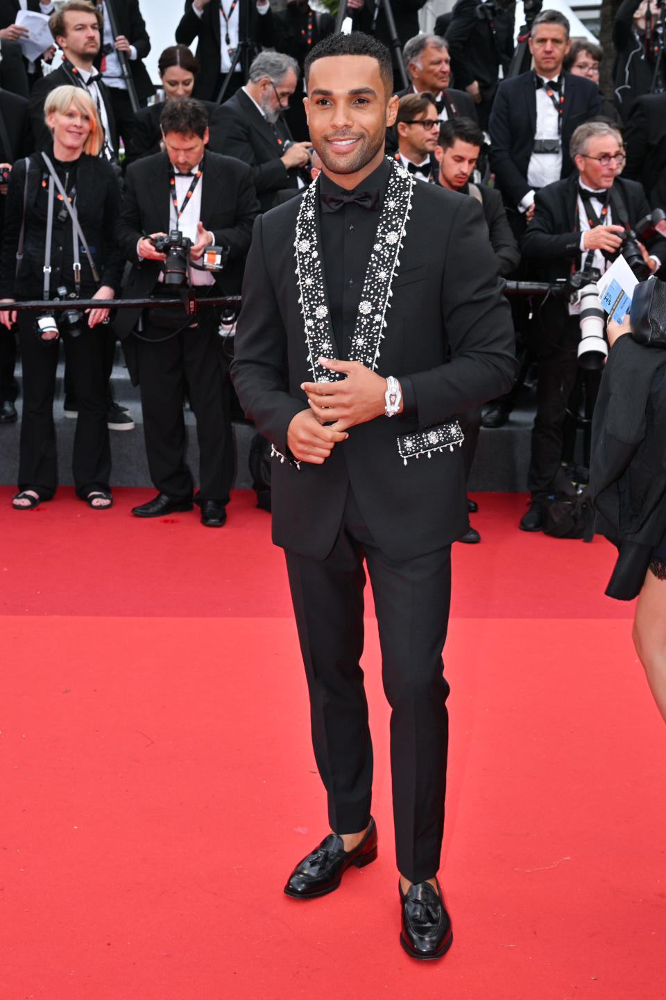 <p>CANNES, FRANCE - MAY 20: Emily in Paris actor Lucien Laviscount appeared on the red carpet wearing a FRED Force 10 Winning Spirit bracelet in white gold, diamond, aquamarine and mother of pearl from the Monsieur Fred Inner Light High Jewelry collection at the Killers Of The Flower Moon red carpet during the 76th annual Cannes film festival at Palais des Festivals on May 20, 2023 in Cannes, France. (PHOTO: Stephane Cardinale - Corbis/Corbis via Getty Images)</p> 