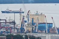 FILE PHOTO: The Venta Maersk in the Russian port of Vladivostok as it prepares to set off on its Arctic voyage