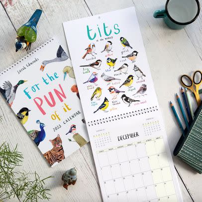 Keep track of your plans while enjoying this punny wall calendar