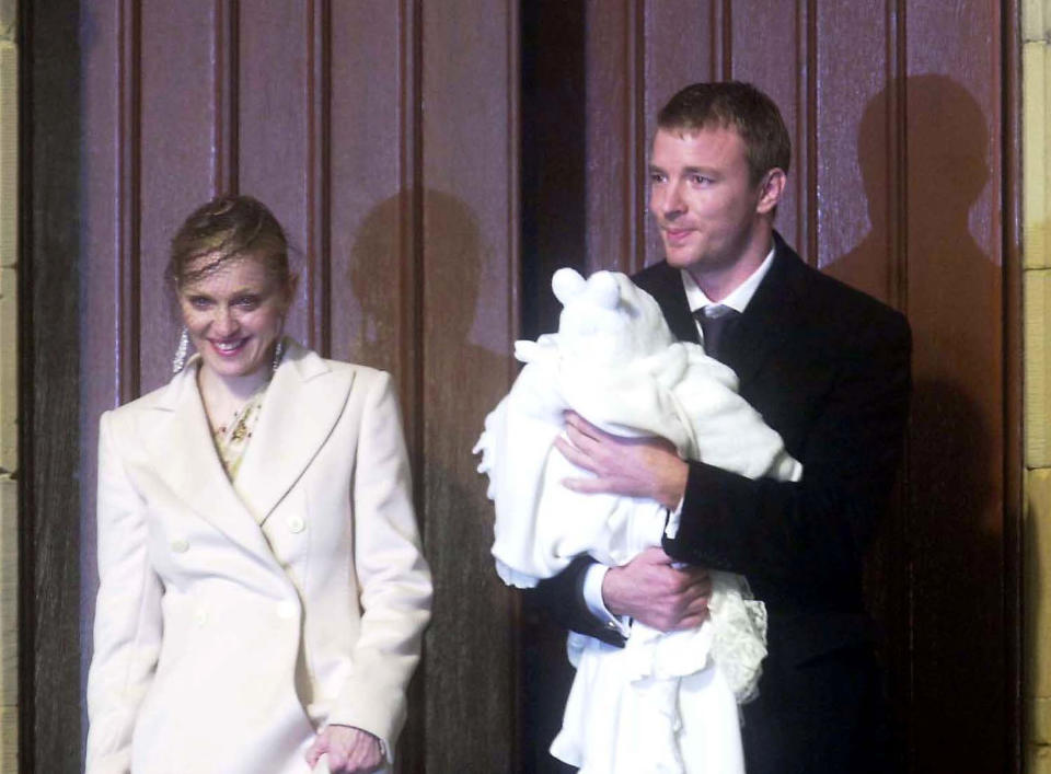 Madonna and Guy Ritchie attend the baptism of their son Rocco at Dornoch Cathedral December 21, 2000 in Scotland. (Photo by Antony Jones/UK Press/Newsmakers)