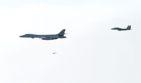 U.S. B-1B Lancer flies over South Korea during a joint live-fire drill in this handout picture provided by South Korean Air Force and relased by Yonhap on July 8, 2017. South Korean Air Force/Yonhap via REUTERS