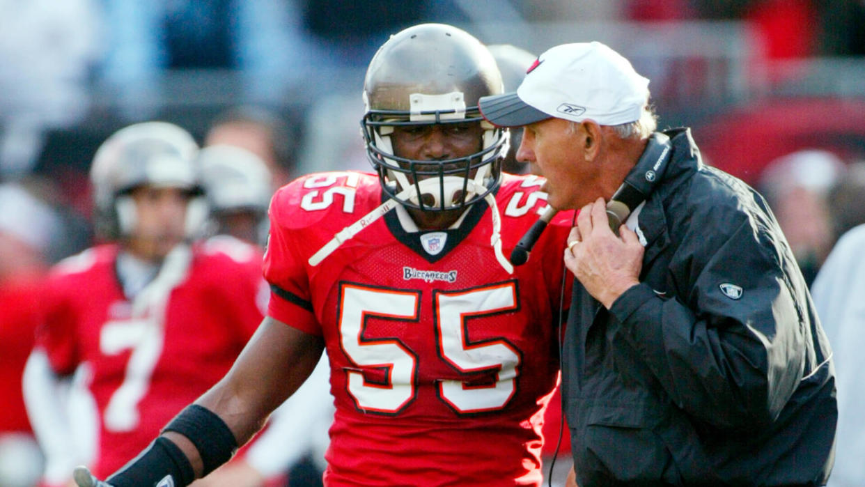 Mandatory Credit: Photo by Phil Coale/AP/Shutterstock (6437577a)BROOKS Tampa Bay Buccaneers linebacker Derrick Brooks speaks with defensive coordinator Monte Kiffin during their NFC divisional playoff game against the San Francisco 49ers in Tampa, FlaNFC BUCCANEERS 49ERS, TAMPA, USA.