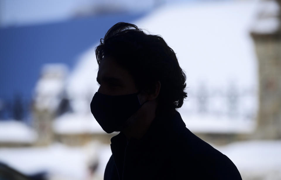 Canadian Prime Minister Justin Trudeau makes his way to hold a press conference in Ottawa, Ontario, on Friday, Feb. 26, 2021, to provide an update on the COVID-19 pandemic and vaccine roll-out in Canada. (Sean Kilpatrick/The Canadian Press via AP)