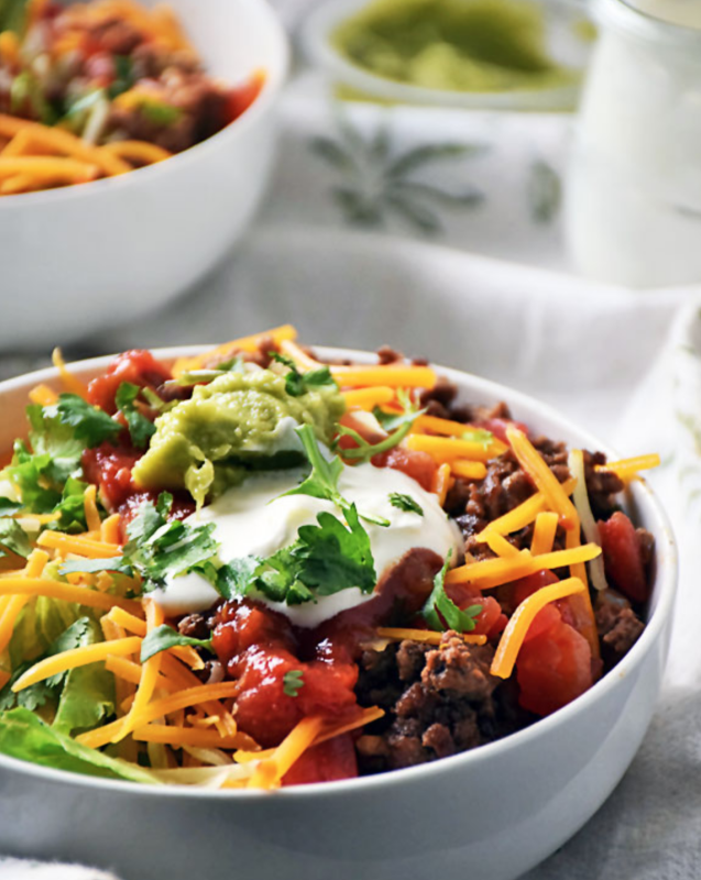 <p>Our Life Tastes Good</p><p>On the table in just 30 minutes, this taco rice bowl is perfect for a quick meal any night of the week and leftovers make for a satisfying lunch too!</p><p><strong>Get the recipe: <a href="https://www.ourlifetastesgood.com/2018/01/taco-rice-bowl.html" rel="nofollow noopener" target="_blank" data-ylk="slk:Taco Rice Bowls;elm:context_link;itc:0;sec:content-canvas" class="link ">Taco Rice Bowls</a></strong></p>