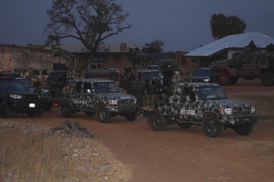 Nigeria army trucks are park in an area were gunmen kidnapped school children in Chikun, Nigeria, Thursday, 7 March, 2024 (AP)