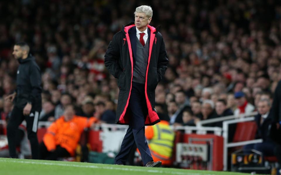 Arsene Wenger in extravagant coat - GETTY IMAGES