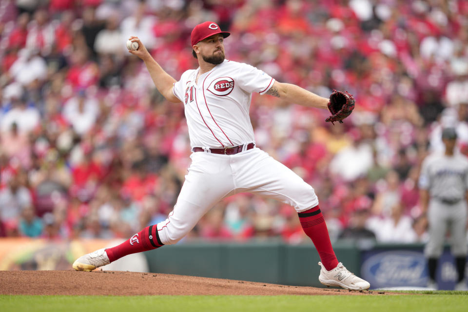 Cincinnati Reds starting pitcher Graham Ashcraft (51) throws against the Miami Marlins during the first inning of a baseball game Wednesday, Aug. 9, 2023, in Cincinnati. (AP Photo/Jeff Dean)