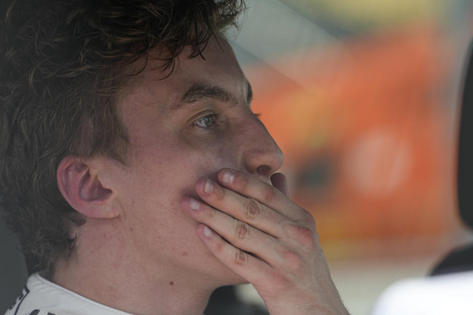 FILE - David Malukas sits in a safety truck after escaping his car that caught fire during the Music City Grand Prix auto race Sunday, Aug. 6, 2023, in Nashville, Tenn. David Malukas was released by Arrow McLaren on Monday, April 29, 2024, without ever running an IndyCar race for the team because of injuries the 22-year-old suffered in an offseason mountain biking crash. (AP Photo/George Walker IV, File)