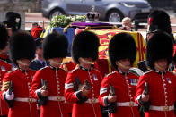 <p>A view of the procession of the coffin of Britain's Queen Elizabeth from Buckingham Palace to the Houses of Parliament for her lying in state, in London, Britain, September 14, 2022. REUTERS/Tom Nicholson</p> 