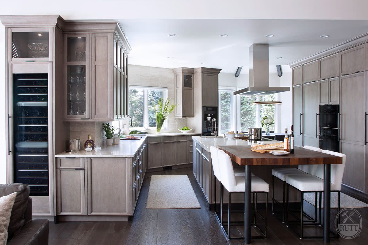 custom cabinets from rutt fit the kitchen precisely for a fully built in look