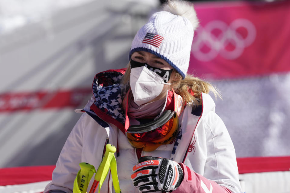 Mikaela Shiffrin, of the United States in the finish area after women's downhill training at the 2022 Winter Olympics, Monday, Feb. 14, 2022, in the Yanqing district of Beijing. (AP Photo/Luca Bruno)