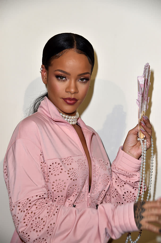 Rihanna's brick red lip contouring is giving us 2000s vibes. (Photo: Getty)