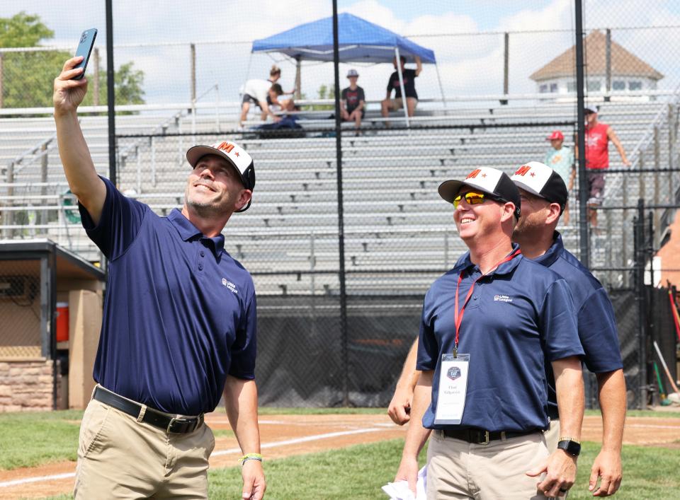 From left, Middleboro 12U Nationals coach Glenn Marzelli takes a 'selfie' with manager Chad Gillpatrick and coach Joe Trottier, before a game versus Concord, New Hampshire at the Bartlett Giamatti Little League Leadership Training Center in Bristol, Connecticut for the New England Regional tournament on Saturday, August  6, 2022.