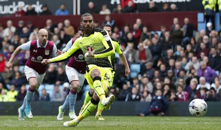 Britain Soccer Football - Aston Villa v Reading - Sky Bet Championship - Villa Park - 15/4/17 Lewis Grabban scores the third goal for Reading Mandatory Credit: Action Images / Matthew Childs Livepic EDITORIAL USE ONLY. No use with unauthorized audio, video, data, fixture lists, club/league logos or "live" services. Online in-match use limited to 45 images, no video emulation. No use in betting, games or single club/league/player publications. Please contact your account representative for further details.