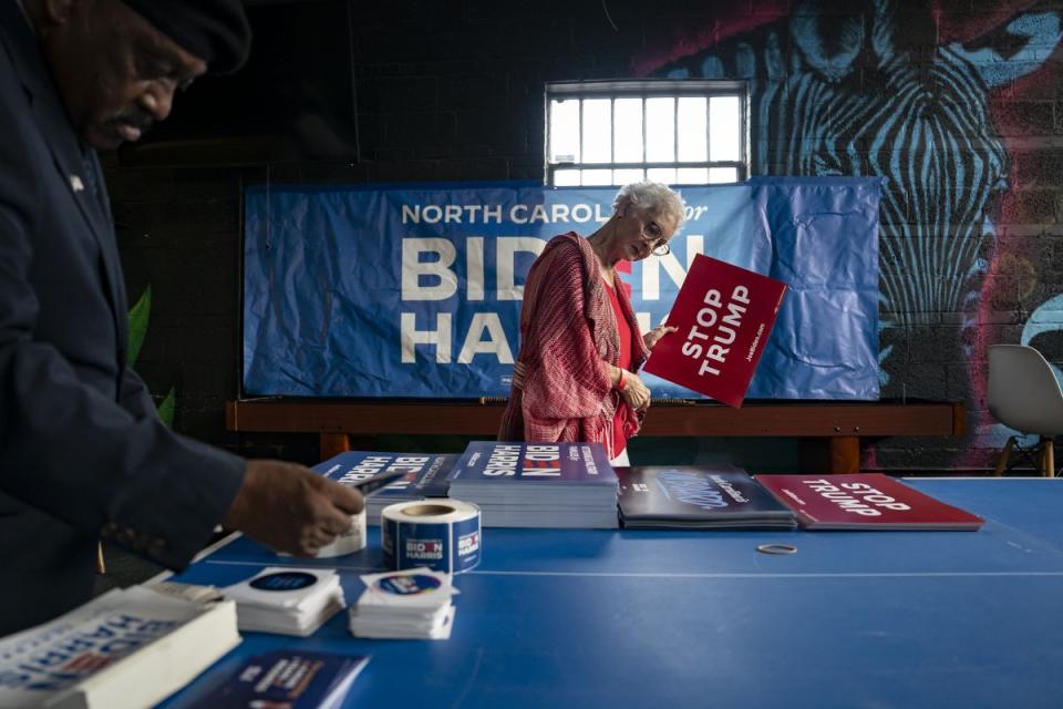 Guests take signs and stickers before First Lady Dr. Jill Biden speaks during a campaign event in Wilmington, North Carolina, on July 8, 2024.<span class="copyright">Allison Joyce—Anadolu/Getty Images</span>