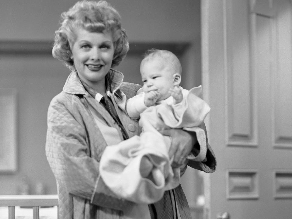 Lucille Ball holding Richard Lee Simmons