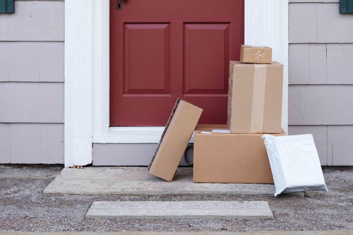 Boxes On Doorstep Of House High-Res Stock Photo - Getty Images