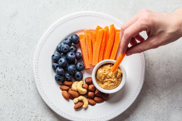 The Best Snacking Habits To Have Over 50, Say Dietitians — Eat