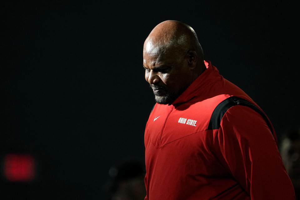 Mar 9, 2023; Columbus, Ohio, USA;  Ohio State Buckeyes defensive line coach Larry Johnson walks through spring football practice at the Woody Hayes Athletic Center. Mandatory Credit: Adam Cairns-The Columbus Dispatch