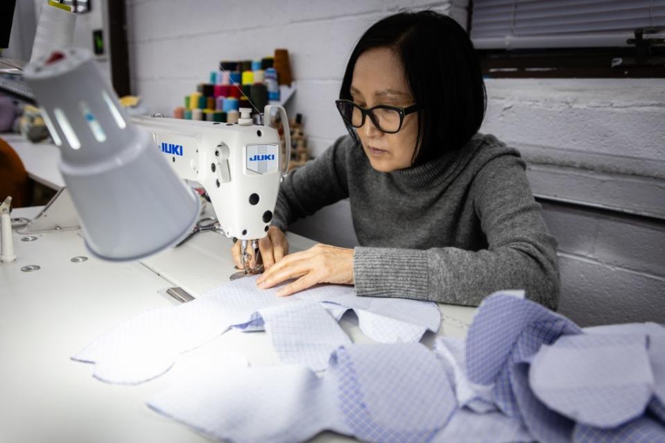 Kim woking on a sewing machine at her Palisades Park studio. Stefan Jeremiah for New York Post