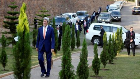 U.S. Secretary of State John Kerry arrives during visit to Kigali Genocide Memorial centre in Rwanda’s capital Kigali, October 14, 2016. REUTERS/James Akena