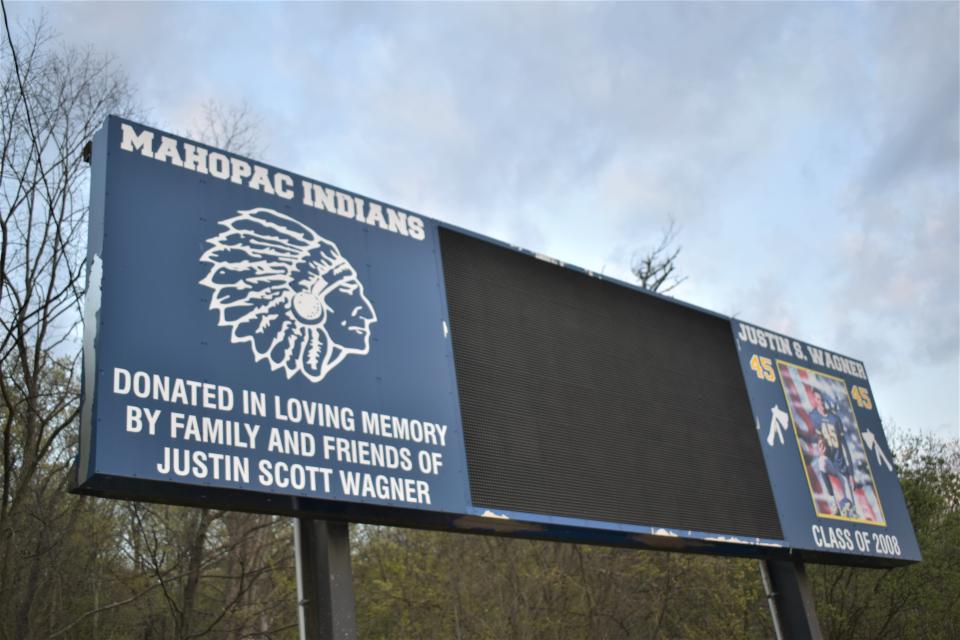The Mahopac High athletic field sign features an image of a Plains Indian, in full headdress, given in memory of Justin Wagner, from Mahopac's Class of 2008.