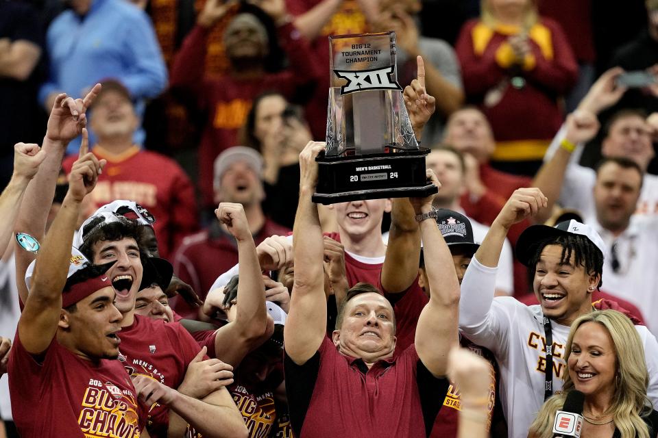 Iowa State's TJ Otzelberger hoisted the Big 12 trophy. He can hold up another in a few weeks.
