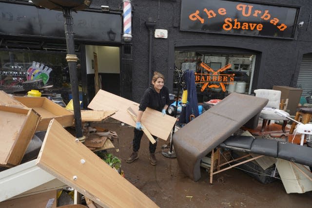 The clean-up continues on Main Street in Midleton, Co Cork, after Storm Babet hit Ireland