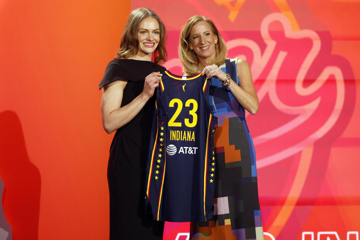 WNBA Commissioner Cathy Engelbert and Grace Berger pose after Berger was drafted No. 7 overall by the Indiana Fever during the 2023 WNBA Draft at Spring Studios in New York City on April 10, 2023. (Sarah Stier/Getty Images)