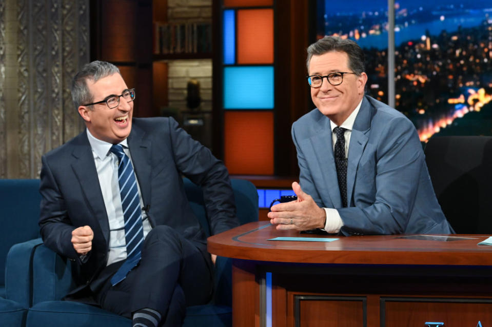 Other shows that share this style include fellow Daily Show alums: Last Week Tonight with John Oliver and the former Daily Show spinoff The Colbert Report.