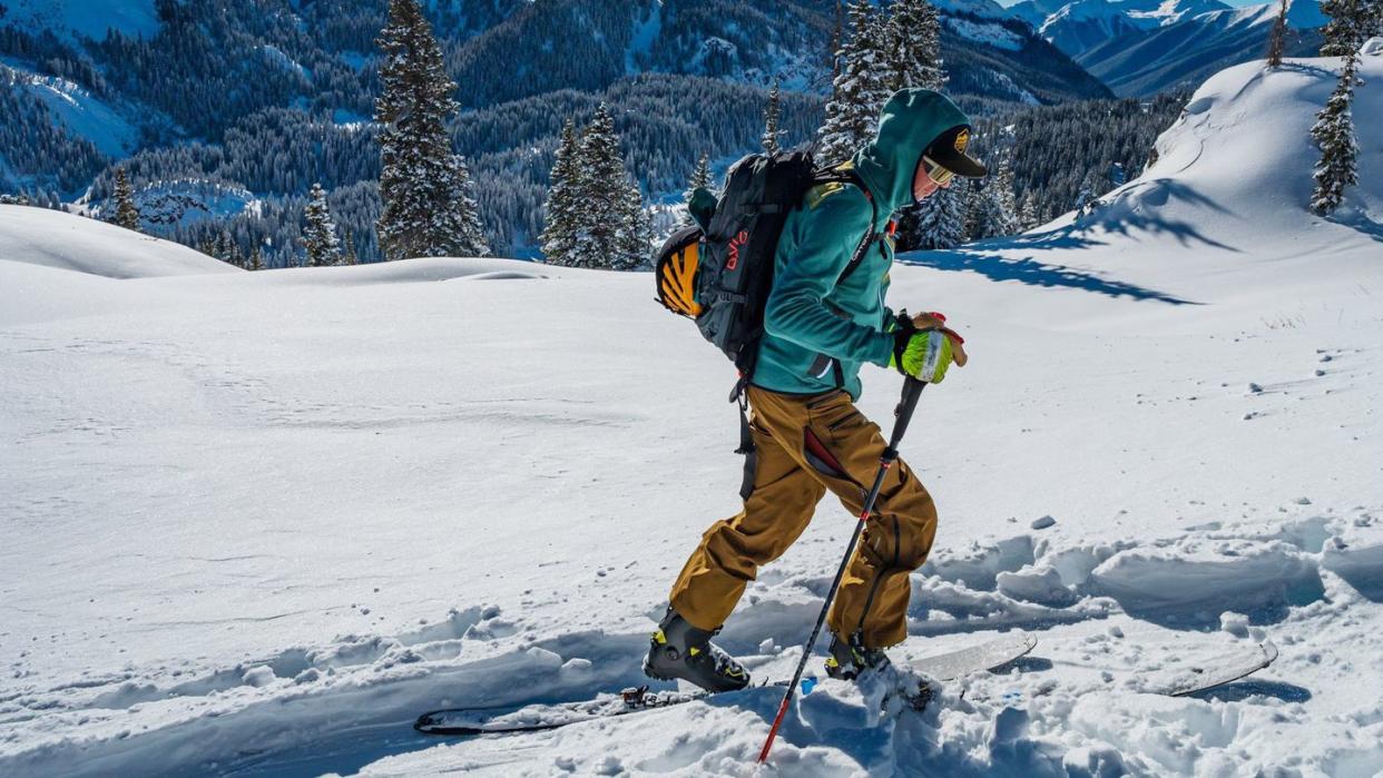 a man skiing on the snow