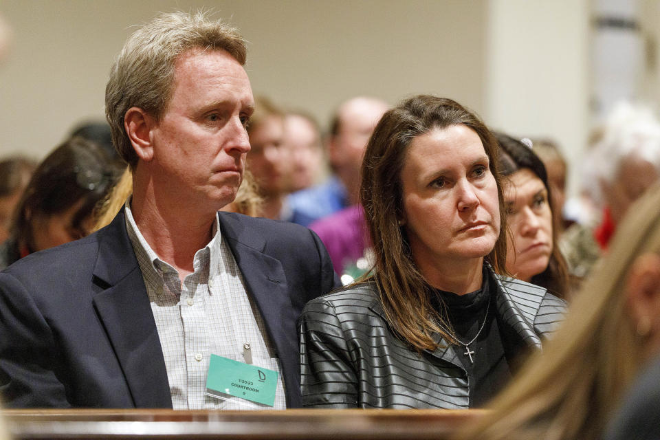 John Marvin Murdaugh and his wife Liz Murdaugh listen to opening statements in his brother Alex Murdaugh's double murder trial at the Colleton County Courthouse in Walterboro, S.C, Wednesday, Jan. 25, 2023. (Grace Beahm Alford/The State via AP)