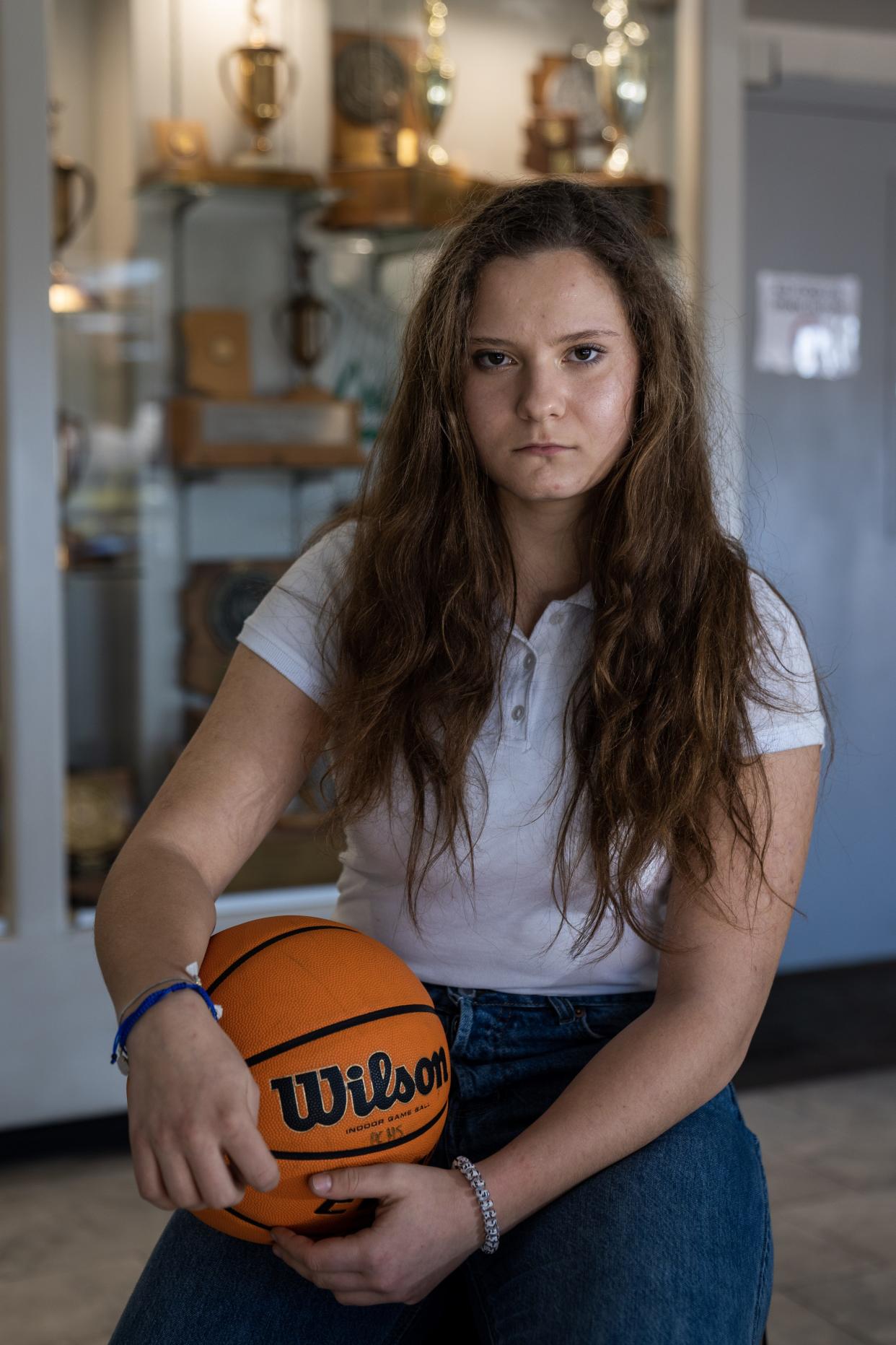 Sasha Danyliuk poses for a portrait at Phoenix Christian Preparatory School on Wednesday, Jan. 4, 2023, in Phoenix. Danyliuk, a refugee from Ukraine, is unable to play on the schools varsity basketball team due to AIA international transfer rules.