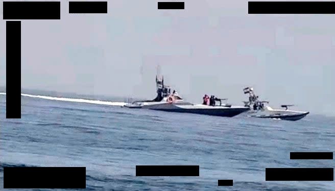 A still image from a video captured by a Task Force 59 USV showing two Iranian fast attack boats. <em>USN</em>