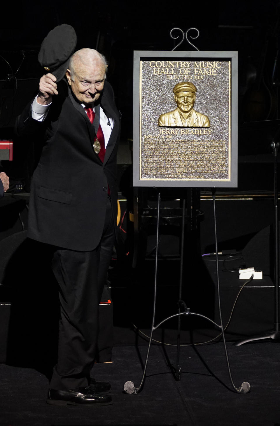 Jerry Bradley gives a tip of the hat after being inducted into the Country Music Hall of Fame during the 2019 Medallion Ceremony at the Country Music Hall of Fame and Museum on Sunday, Oct. 20, 2019 in Nashville, Tenn. (Photo by Sanford Myers/Invision/AP)