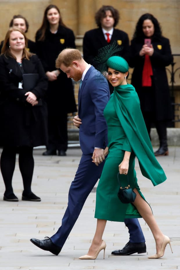 <p>An <a href="https://fashionista.com/2020/03/meghan-markle-wore-green-emilia-wickstead-dress" rel="nofollow noopener" target="_blank" data-ylk="slk:Emilia Wickstead cape dress;elm:context_link;itc:0;sec:content-canvas" class="link ">Emilia Wickstead cape dress</a> at the Commonwealth Day festivities at Westminster Abbey. <em>Photo: </em><em>Tolga Akmen/AFP via Getty Images</em></p><p>Photo: Tolga Akmen/AFP via Getty Images</p>