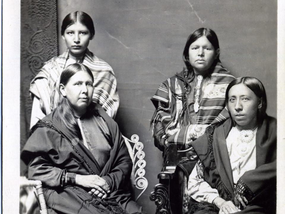 Portrait of an Osage woman and her children circa 1918-1922.