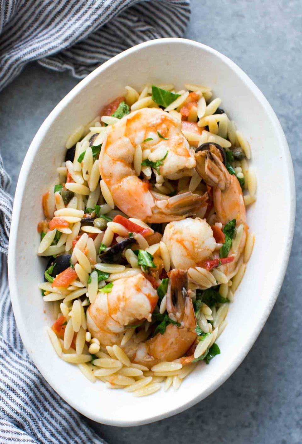 <strong>Get the <a href="http://www.simplyrecipes.com/recipes/shrimp_with_olives_tomatoes_and_orzo/" target="_blank">Shrimp with Olives, Tomatoes, and Orzo recipe</a>&nbsp;from Simply Recipes</strong>