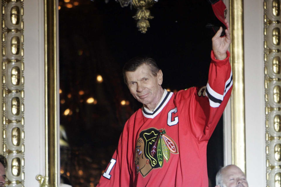 FILE - In this July 15, 2011, file photo, Chicago Blackhawks great Stan Mikita is introduced on opening night of the fourth annual Blackhawks Convention in Chicago. A posthumous study of Mikita's brain shows the hockey Hall of Famer suffered from chronic traumatic encephalopathy at the time of his death a year ago. Dr. Ann McKee, the director of the BU CTE Center, announced the findings during the Concussion Legacy Foundation's Chicago Honors Dinner on Friday night, Sept. 13, 2019, at the request of Mikita's family. (Brian Hill/Daily Herald via AP, File)