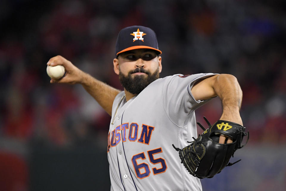 Houston Astros starting pitcher Jose Urquidy throws to the plate during the first inning of a baseball game against the Los Angeles Angels, Friday, Sept. 27, 2019, in Anaheim, Calif. (AP Photo/Mark J. Terrill)